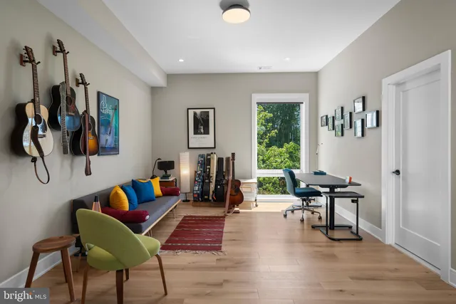 a bathroom with a shower sink and mirror