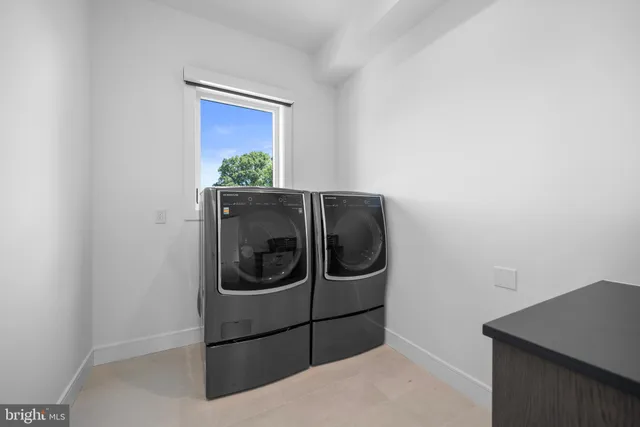 a view of entryway with stairs and wooden floor