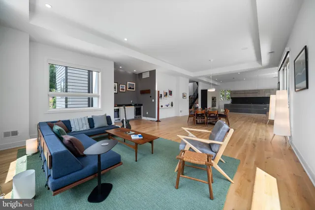 a room with furniture and a wooden floor