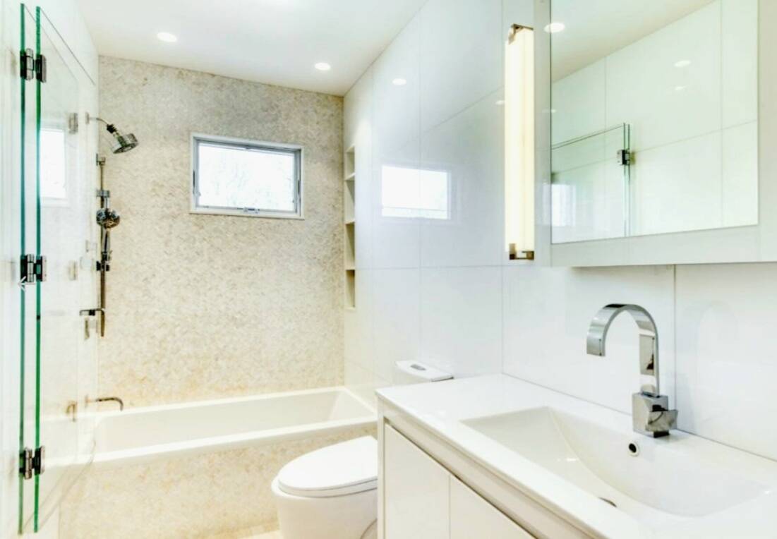 4 Waterview Road Sag Harbor, NY 11963 - Photo 6 of 12 a bathroom with a sink toilet and shower