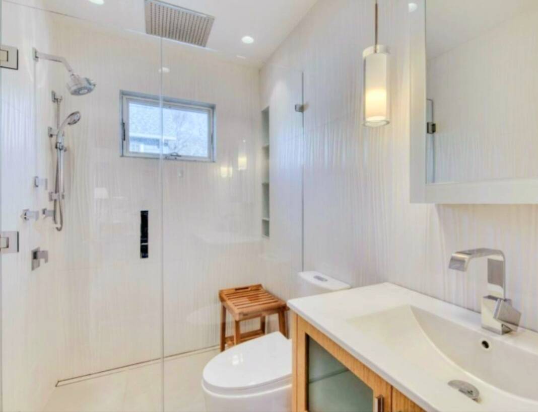 4 Waterview Road Sag Harbor, NY 11963 - Photo 10 of 12 a bathroom with a sink toilet and shower