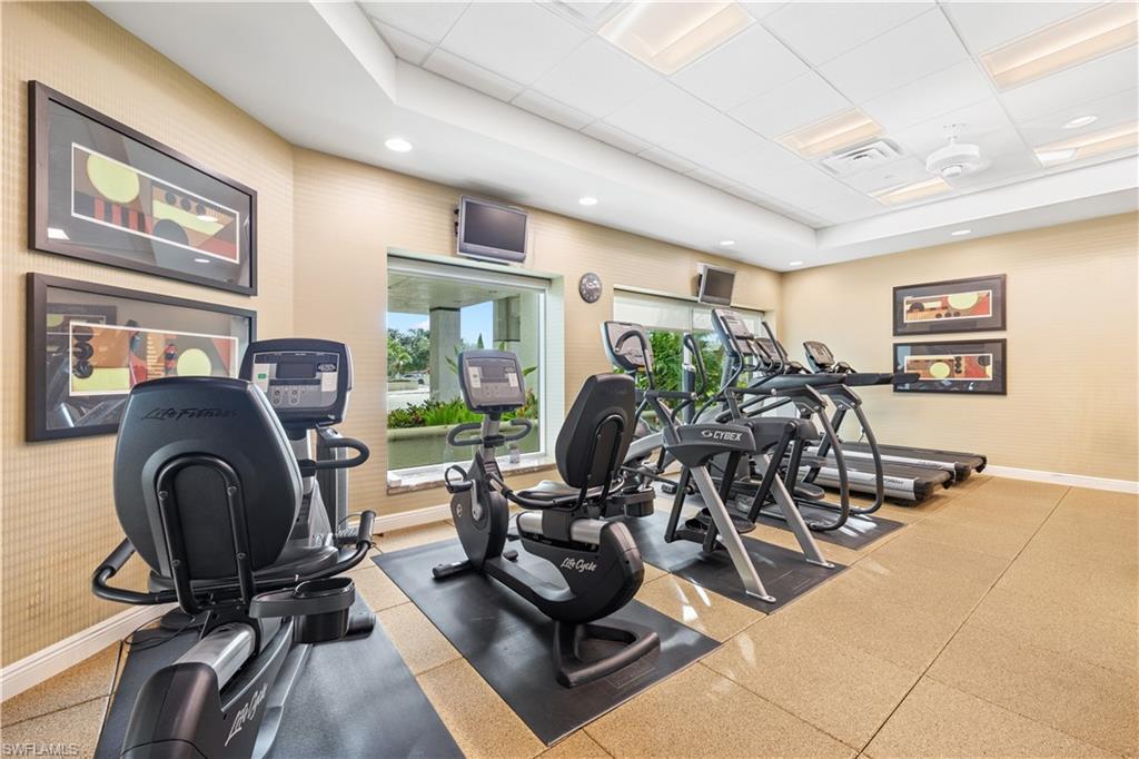 275 Indies Way, Unit 403 Naples, FL 34110 - Photo 38 of 50 a view of a room with gym equipment
