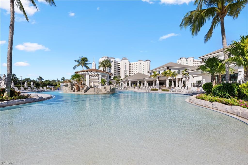 275 Indies Way, Unit 403 Naples, FL 34110 - Photo 45 of 50 a view of a lake