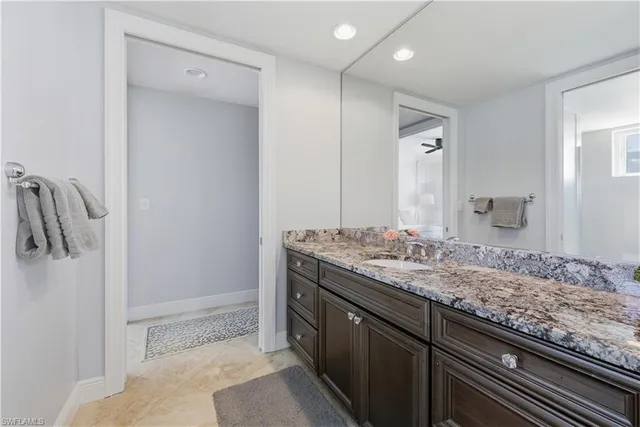 a bathroom with a shower and toilet