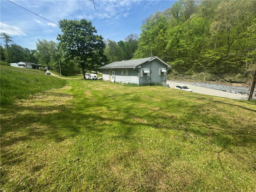371 Garner Run Road Waynesburg, PA 15370 - Photo 13 of 15 a front view of house with yard and green space
