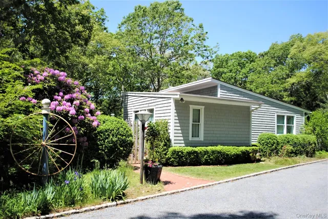 a front view of house with yard
