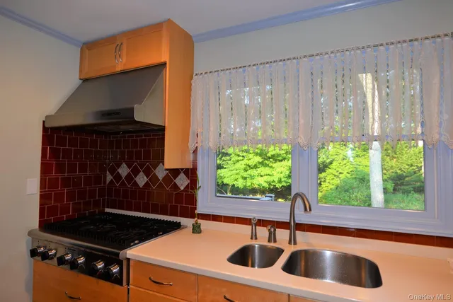 a kitchen sink with a stove