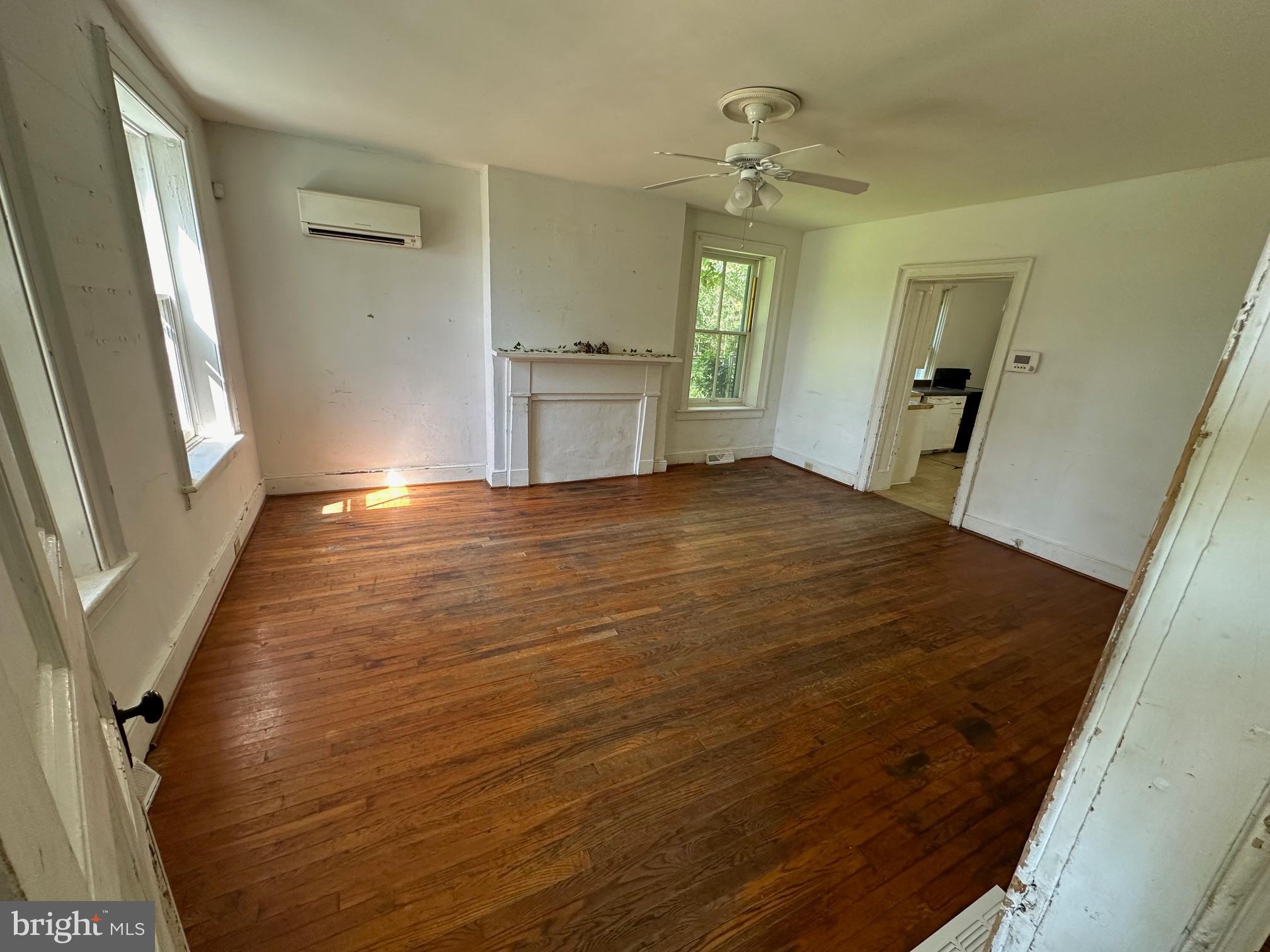 2255 Luther Jones Road Shenandoah Junction, WV 25442 - Photo 12 of 23 a view of an empty room with window and wooden floor