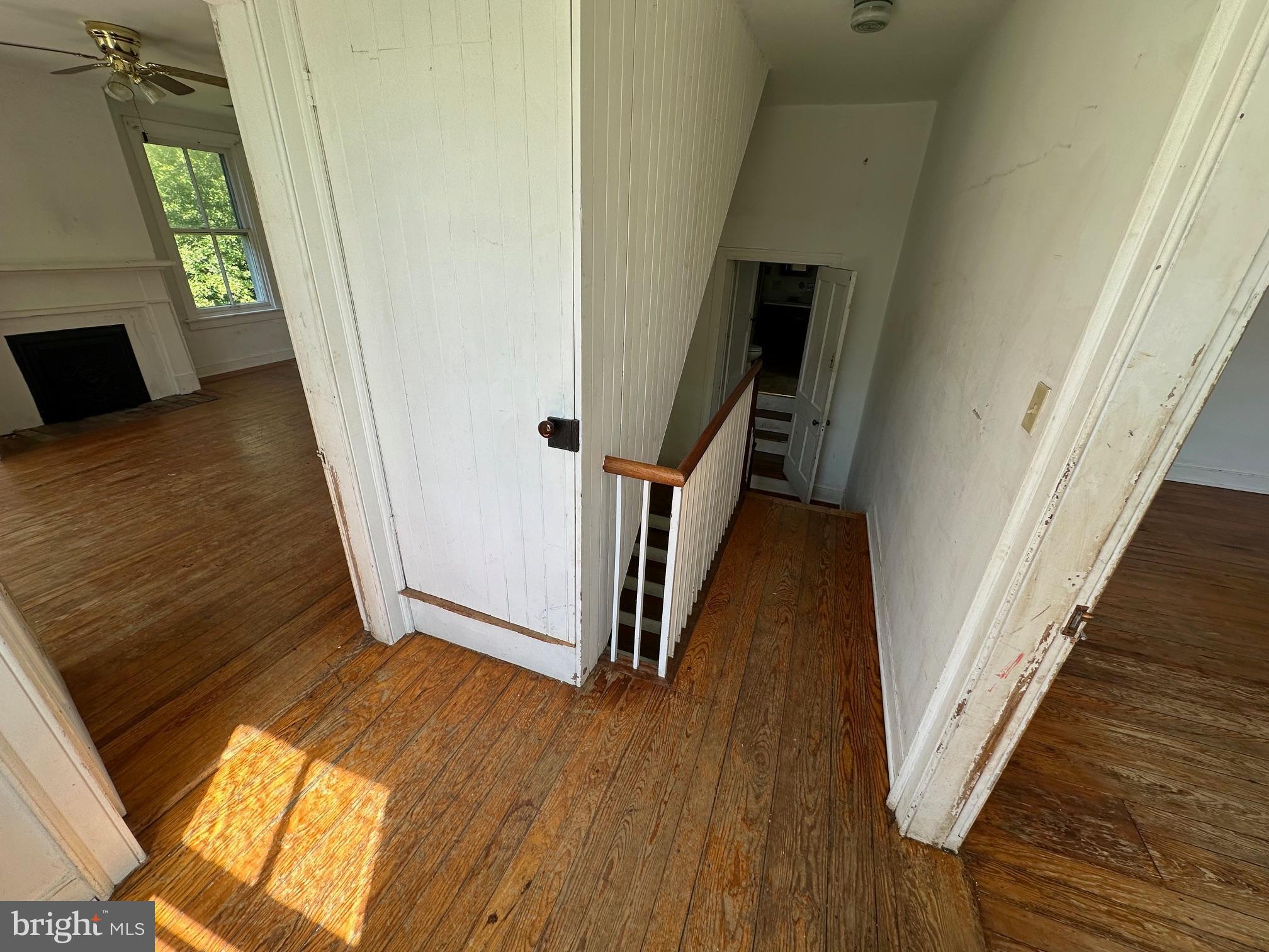 2255 Luther Jones Road Shenandoah Junction, WV 25442 - Photo 16 of 23 a view of a hallway with wooden floor and staircase