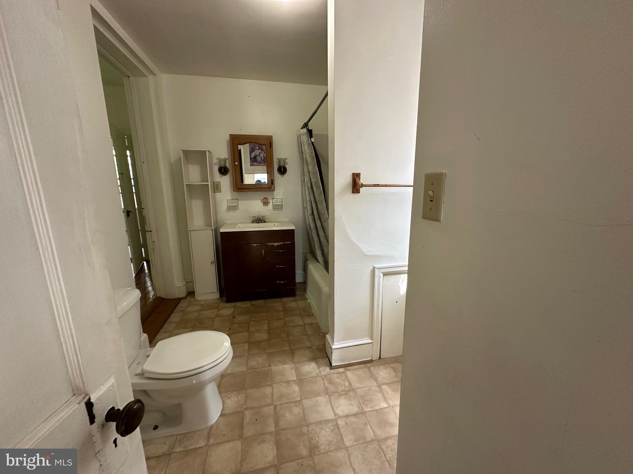 2255 Luther Jones Road Shenandoah Junction, WV 25442 - Photo 23 of 23 a bathroom with a sink a toilet and a mirror