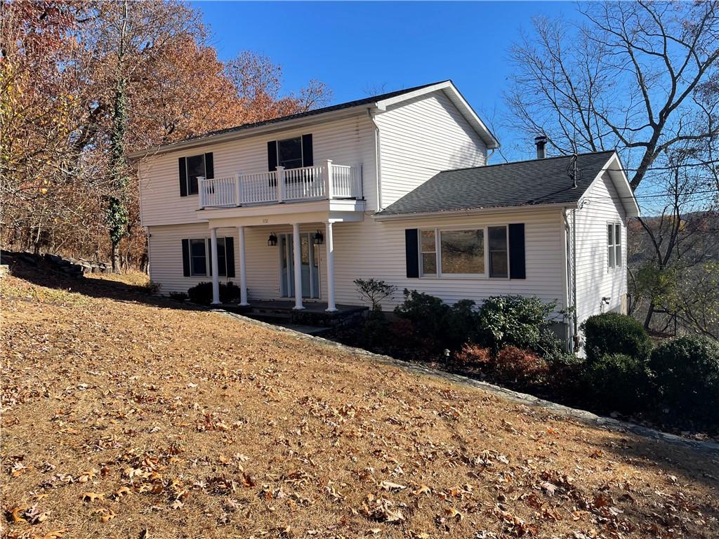 172 Beverly Road Mount Kisco, NY 10549 - Photo 1 of 1 a front view of a house with a yard