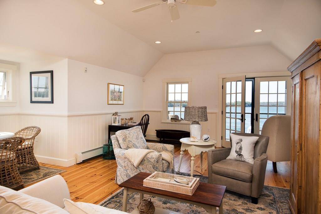 75 Main Street, Unit 5 Newcastle, ME 04553 - Photo 5 of 18 Living room opening onto the...