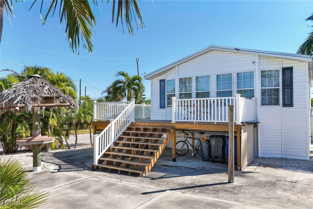 2831 York Road St. James City, FL 33956 - Photo 5 of 29 a view of outdoor space yard deck patio and swimming pool