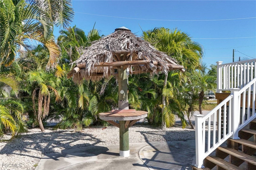 2831 York Road St. James City, FL 33956 - Photo 6 of 29 a view of a backyard with of water fountain