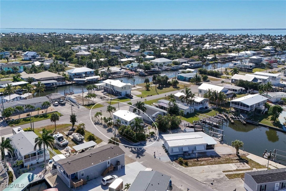 2831 York Road St. James City, FL 33956 - Photo 10 of 29 an aerial view of a city with lots of residential buildings