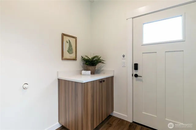 a bathroom with a sink and mirror