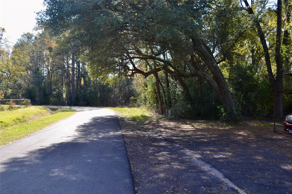 Tract #2 Long Street Waskom, TX 75692 - Photo 13 of 19 a house view with swimming pool