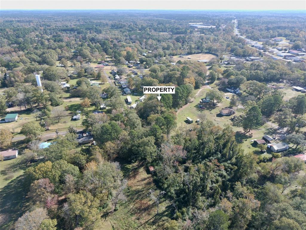 Tract #2 Long Street Waskom, TX 75692 - Photo 16 of 19 an aerial view of residential houses with outdoor space and trees