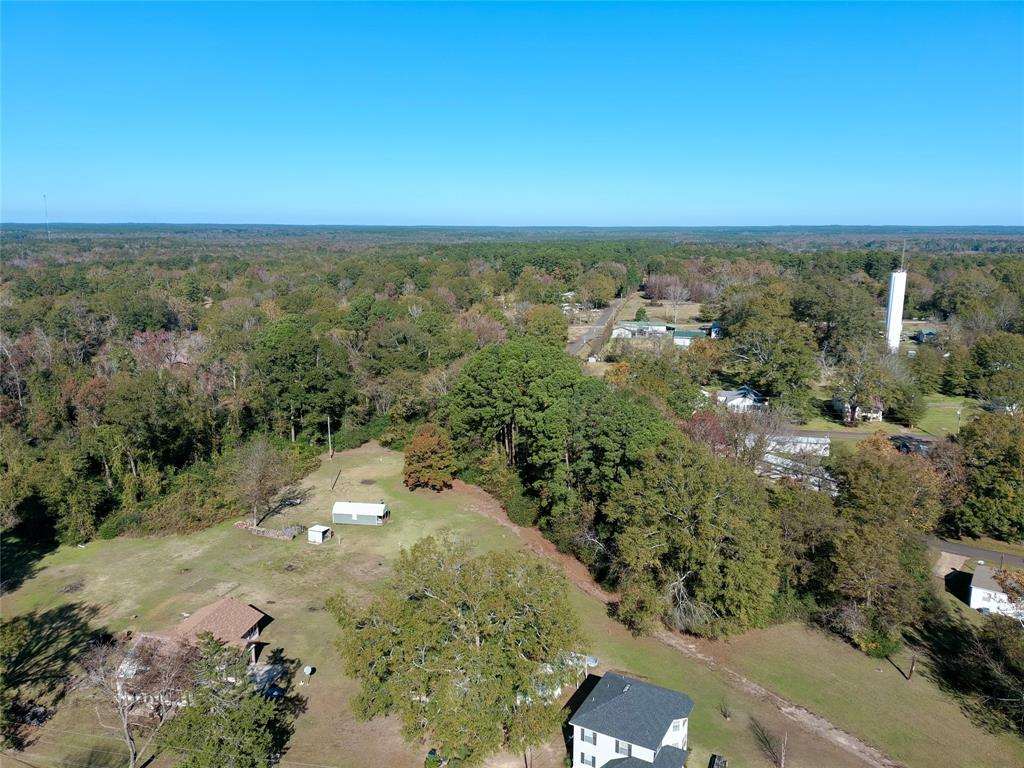 Tract #2 Long Street Waskom, TX 75692 - Photo 7 of 19 an aerial view of a houses with a yard