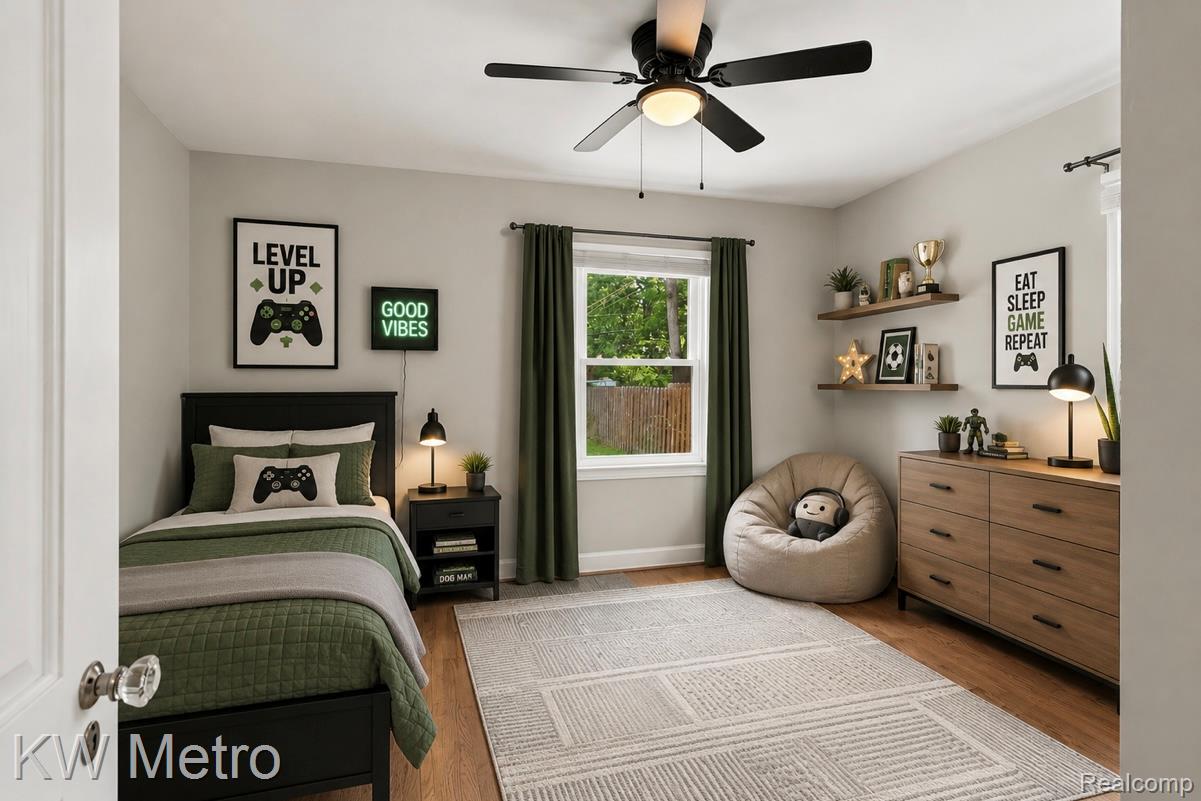 1458 Hampton Road Grosse Pointe, MI 48236 - Photo 14 of 43 Bright room with light gray walls and wood-finish flooring
