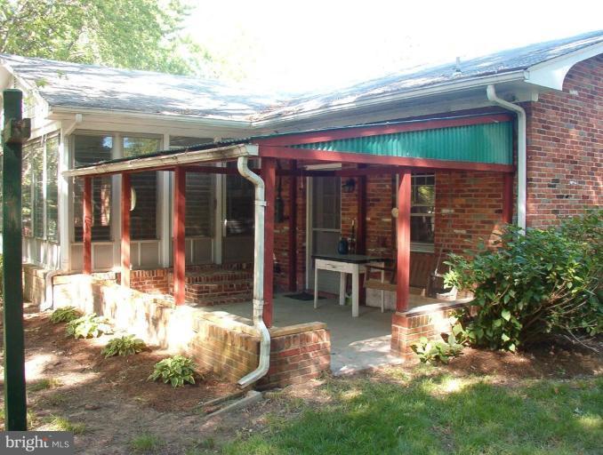2617 Cox Neck Road Chester, MD 21619 - Photo 14 of 26 Shaded porch for crab feasts and parties