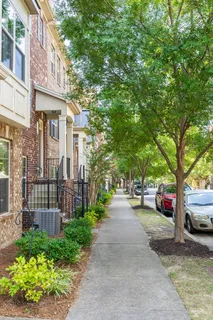 a view of a street with cars on road