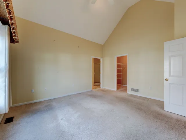 an empty room with windows