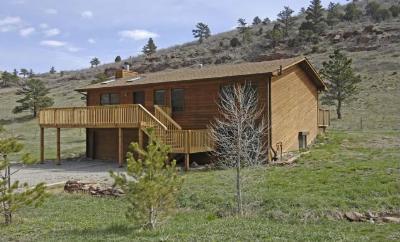 7264 Olde Stage Road Boulder, CO 80302 - Photo 1 of 1 a view of a house with a yard