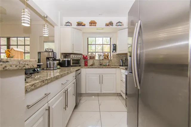 $669,000 | 943 West 64th Place, Hialeah, FL 33012