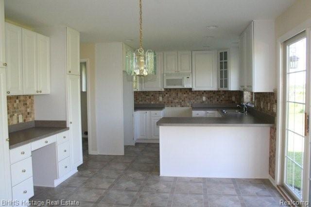1207 North Nicholson Road Fowlerville, MI 48836 - Photo 8 of 21 Kitchen
