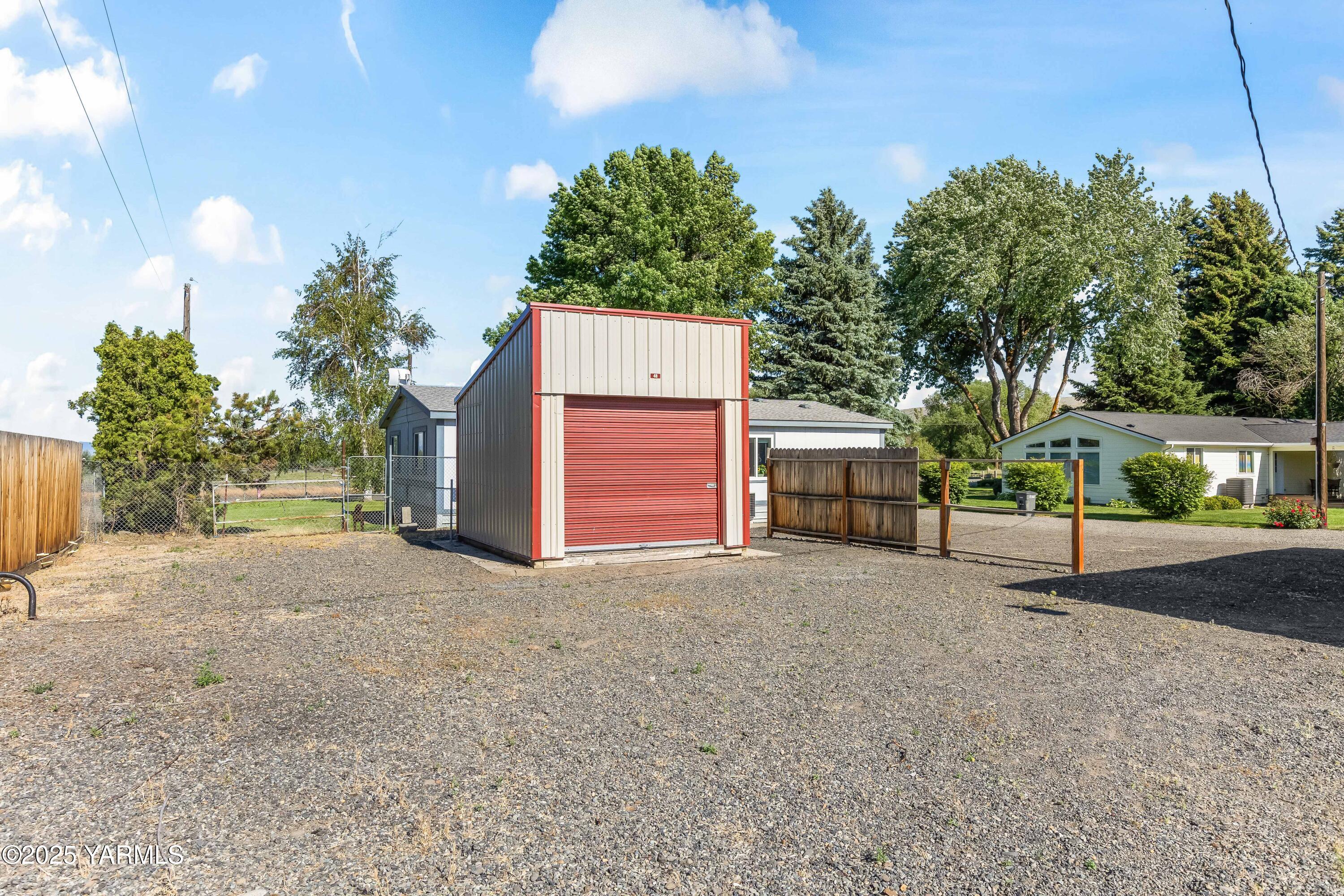 3404 Stanton Road Yakima, WA 98903 - Photo 26 of 37 a view of a house with a yard and garage