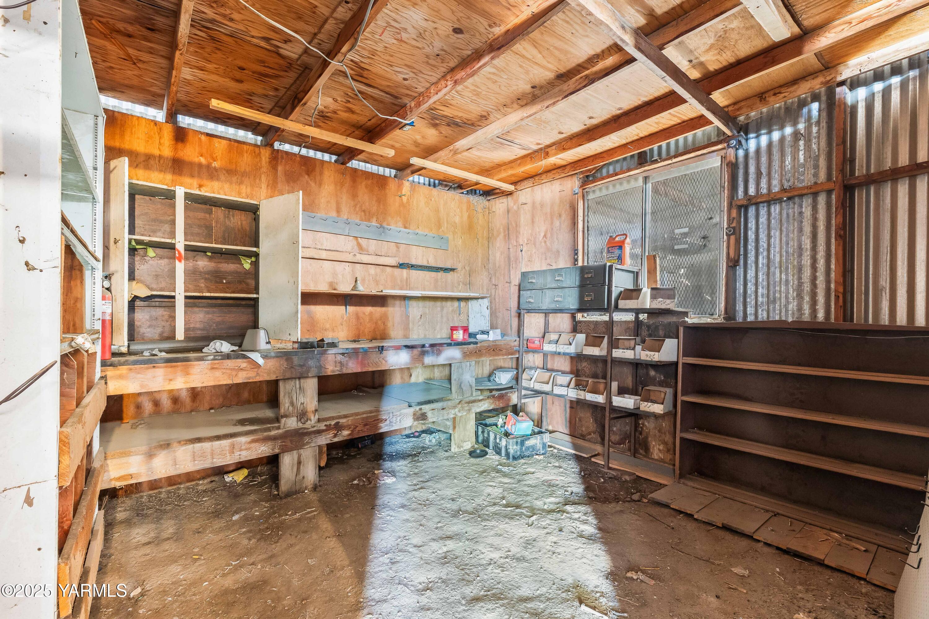 3404 Stanton Road Yakima, WA 98903 - Photo 29 of 37 a view of store room with wooden floor