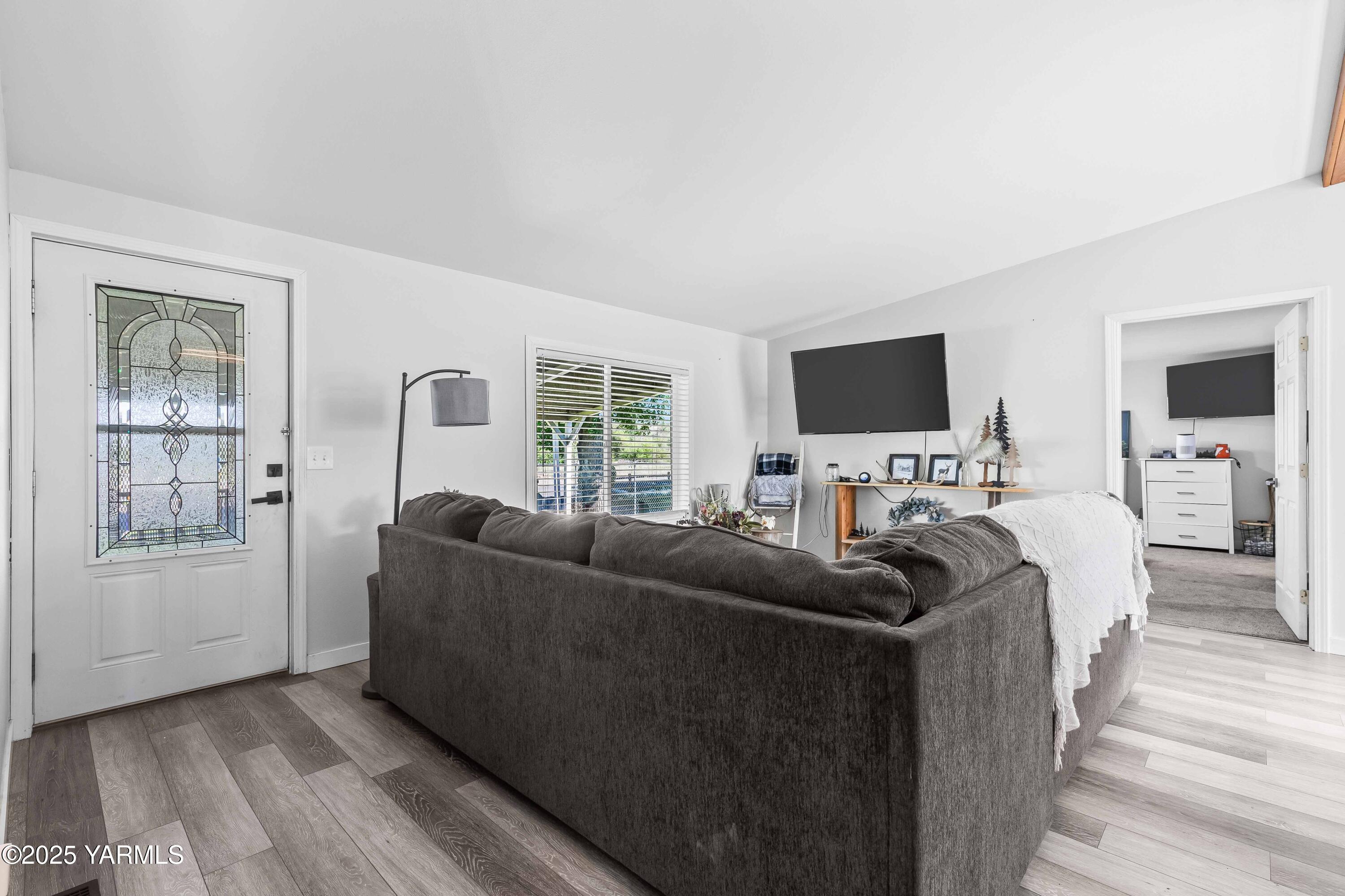 3404 Stanton Road Yakima, WA 98903 - Photo 5 of 37 a living room with furniture and a flat screen tv