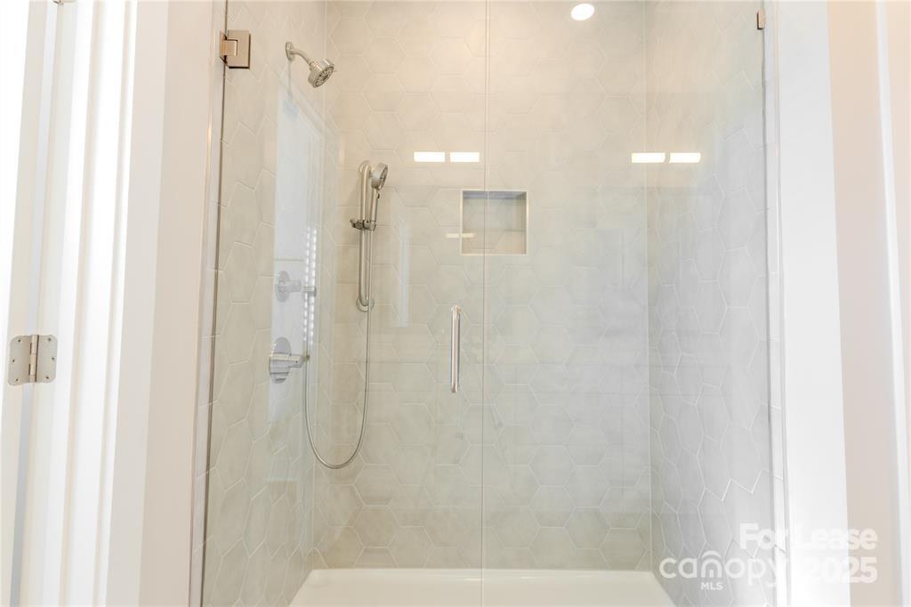3110 Doe River Way, Unit WHITBY Matthews, NC 28105 - Photo 47 of 48 a bathroom with a shower