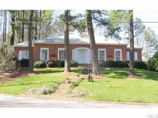 1101 Bancroft Street Raleigh, NC 27612 - Photo 1 of 10 front view of a house with a yard