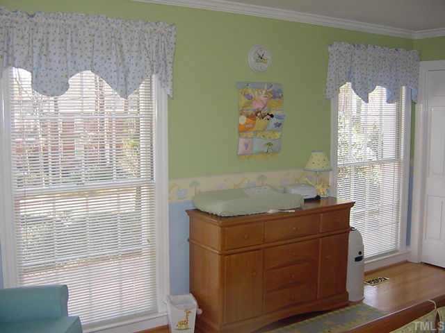 1101 Bancroft Street Raleigh, NC 27612 - Photo 7 of 10 a room with cabinets and outdoor space