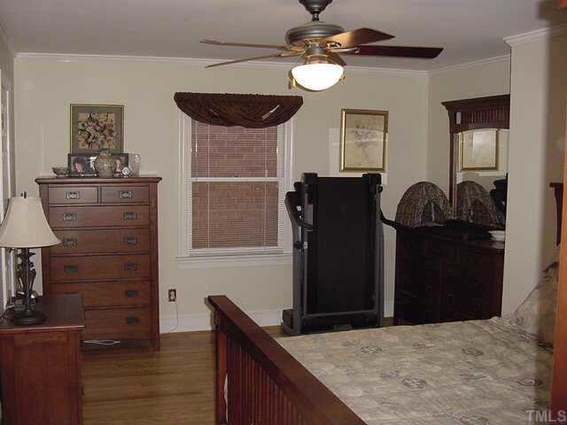 1101 Bancroft Street Raleigh, NC 27612 - Photo 8 of 10 a view of a refrigerator and cabinets