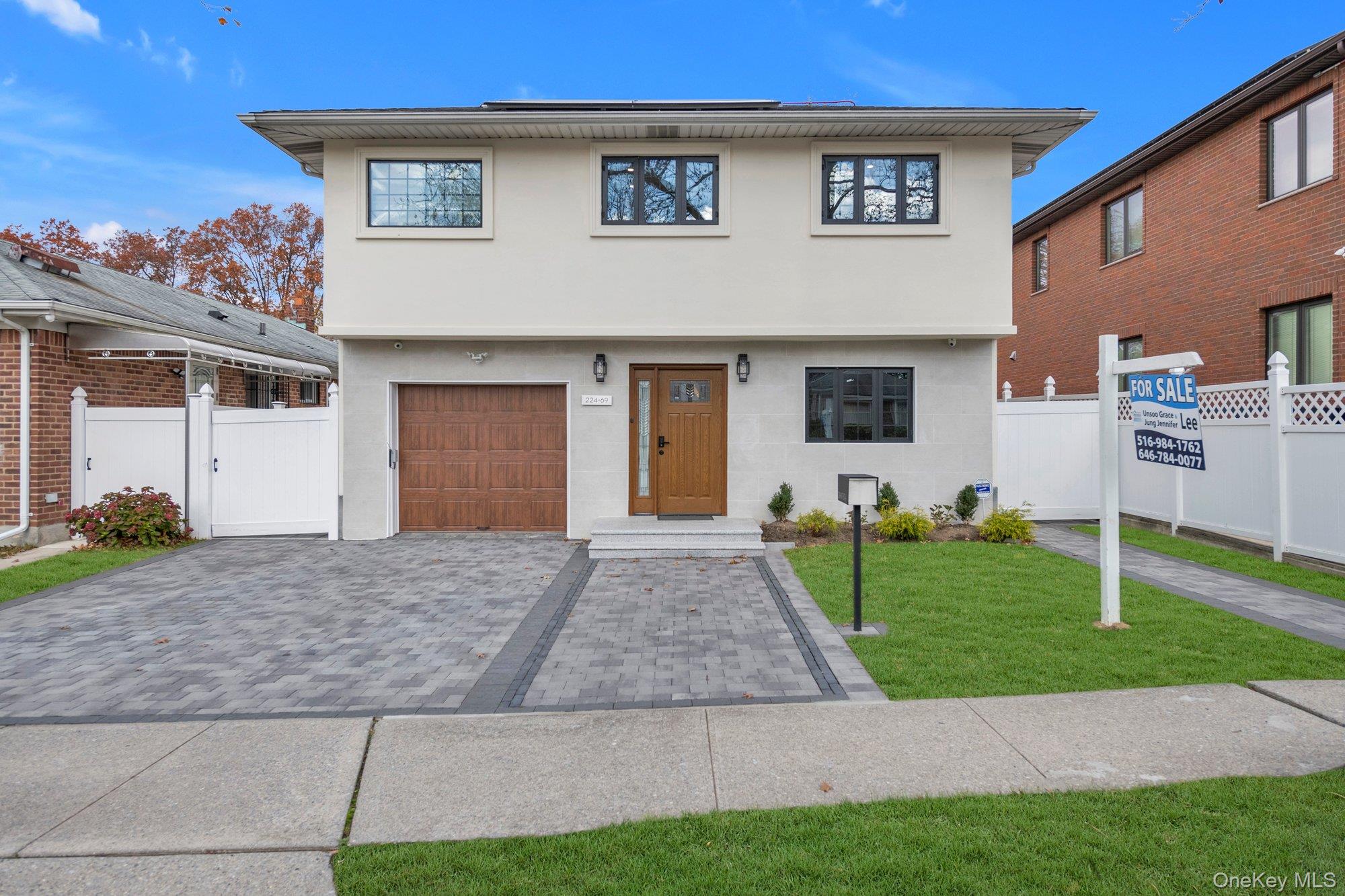 a front view of house with yard