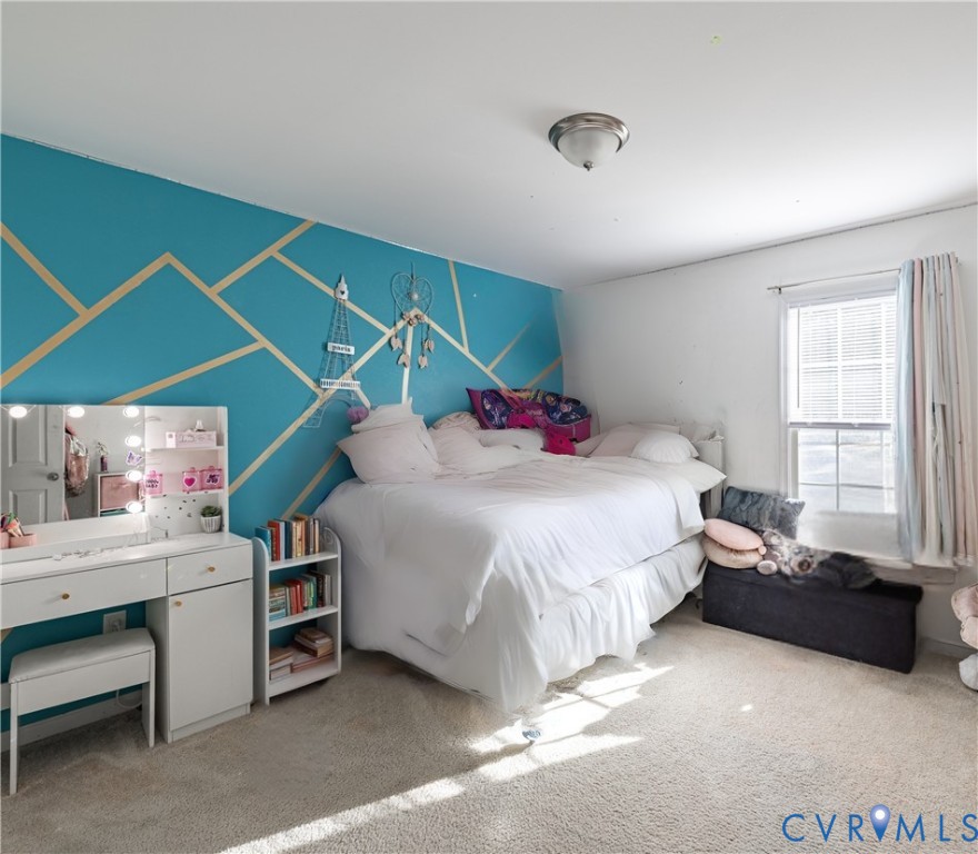 1920 Meadow Road Sandston, VA 23150 - Photo 15 of 30 a bedroom with a bed and a window