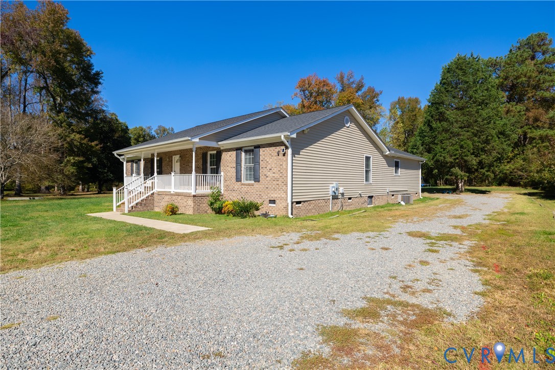 1920 Meadow Road Sandston, VA 23150 - Photo 18 of 30 a view of a house with a yard and potted plants