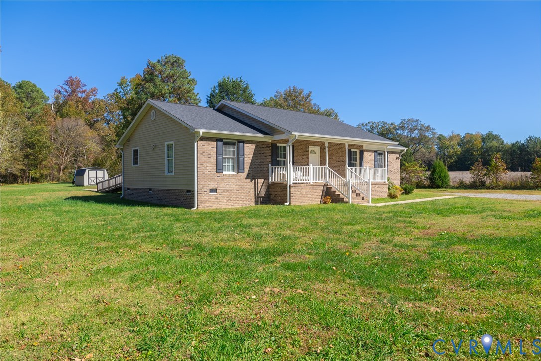 1920 Meadow Road Sandston, VA 23150 - Photo 19 of 30 a front view of house with yard and green space