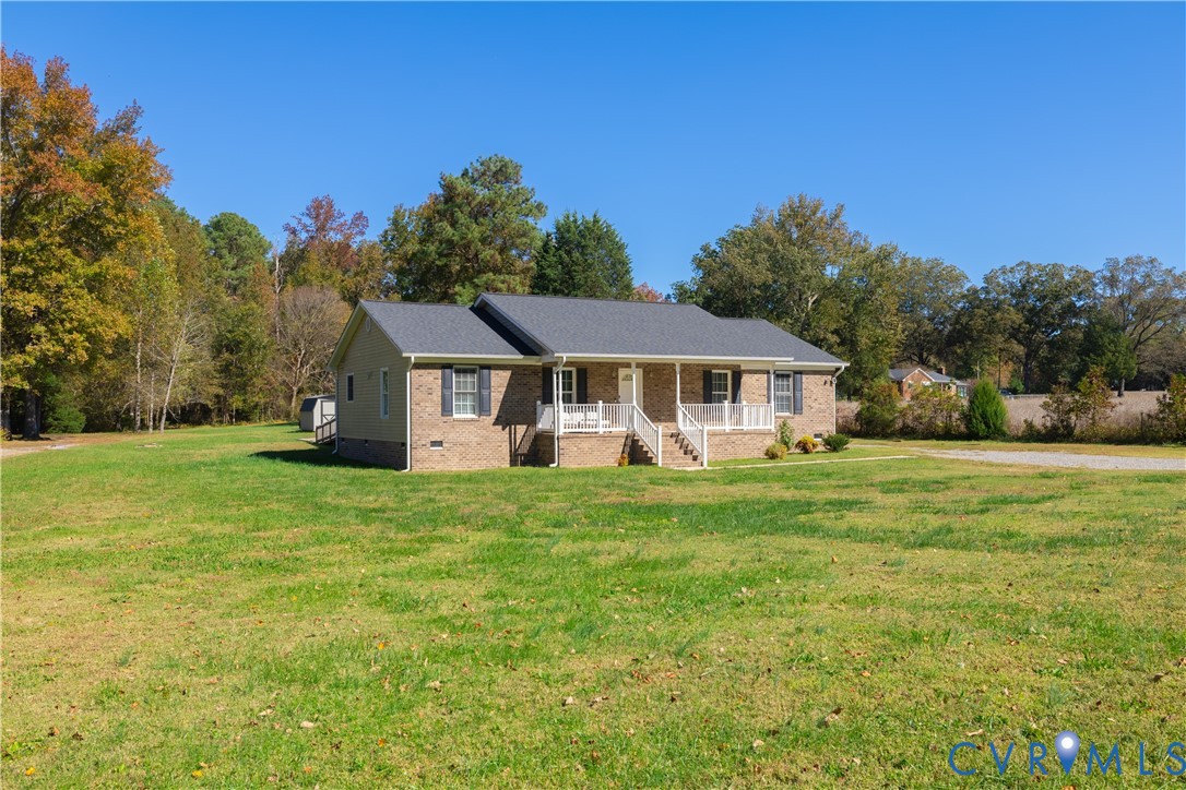 1920 Meadow Road Sandston, VA 23150 - Photo 29 of 30 a front view of a house with a garden