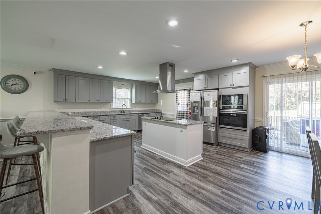 1920 Meadow Road Sandston, VA 23150 - Photo 4 of 30 a kitchen with a sink stainless steel appliances and cabinets