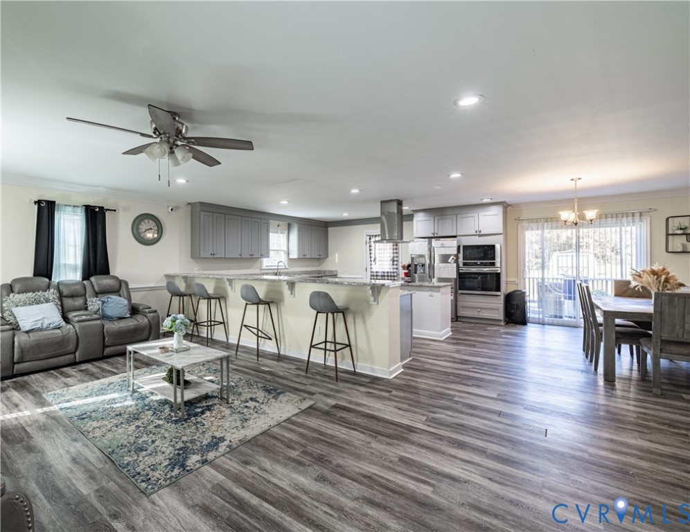 1920 Meadow Road Sandston, VA 23150 - Photo 6 of 30 a living room with furniture and kitchen view