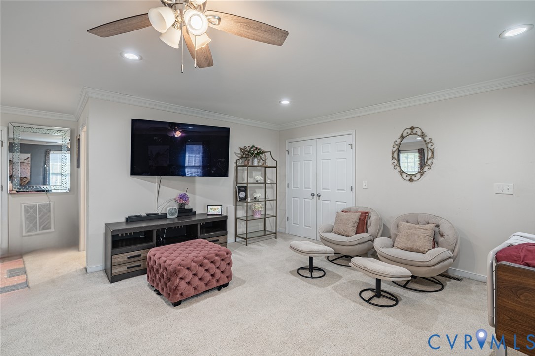 1920 Meadow Road Sandston, VA 23150 - Photo 7 of 30 a living room with furniture and a flat screen tv