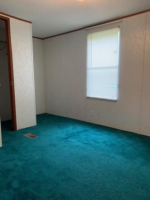 5552 Ferrum Mountain Road Callaway, VA 24067 - Photo 12 of 21 an empty room with a window