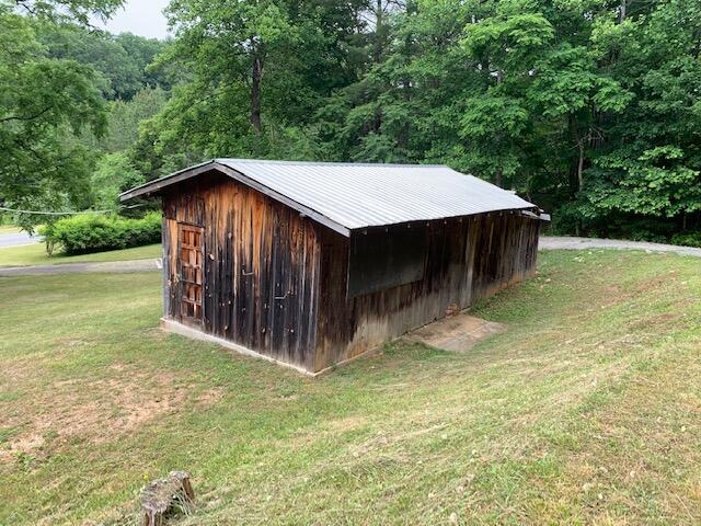 5552 Ferrum Mountain Road Callaway, VA 24067 - Photo 19 of 21 a wooden house with a outdoor space