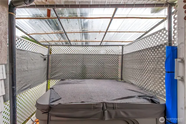 a view of a fountain in front of a house with a fountain