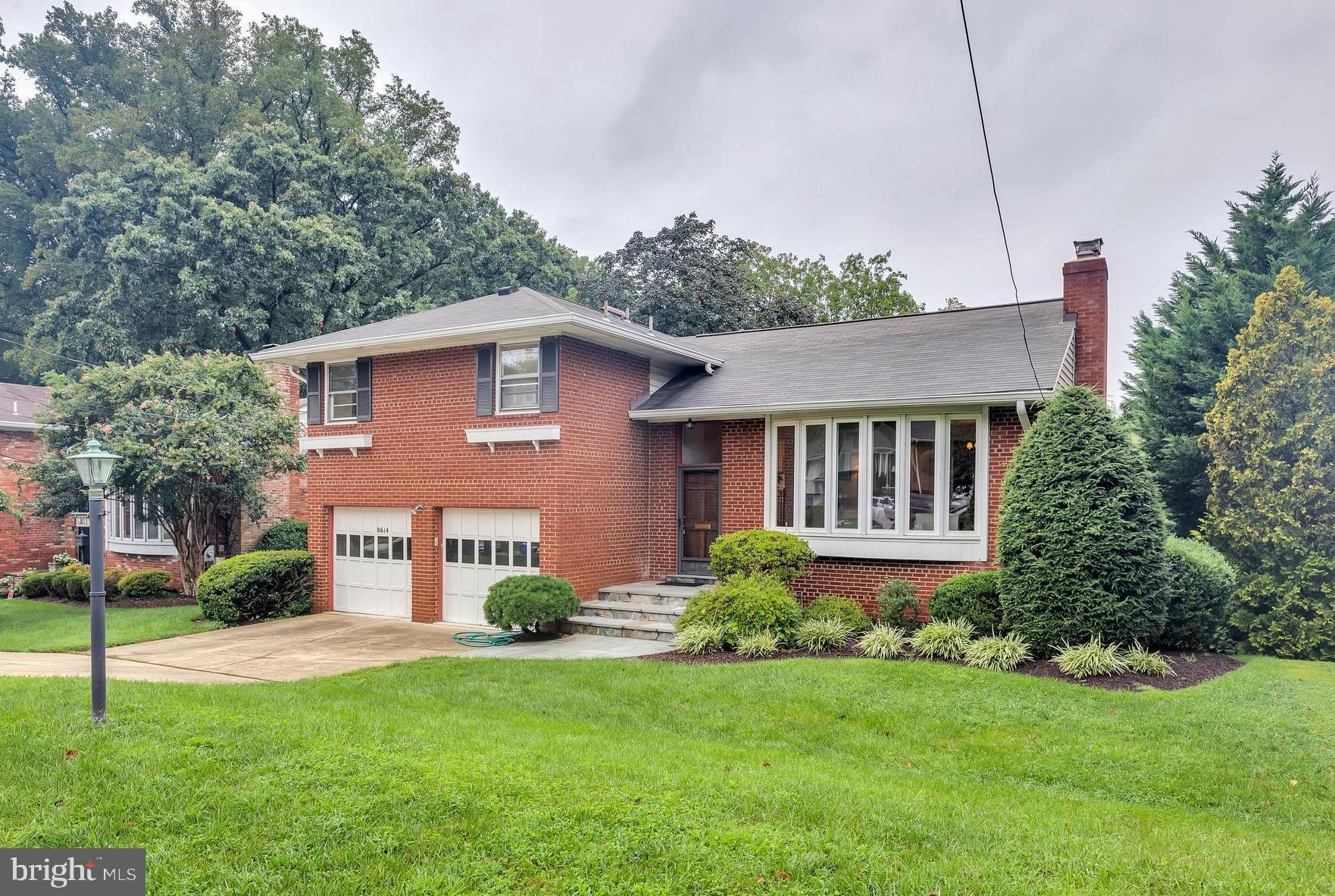 Handsome brick and siding split in Bradmoor