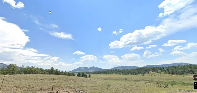 a view of a lake and mountain